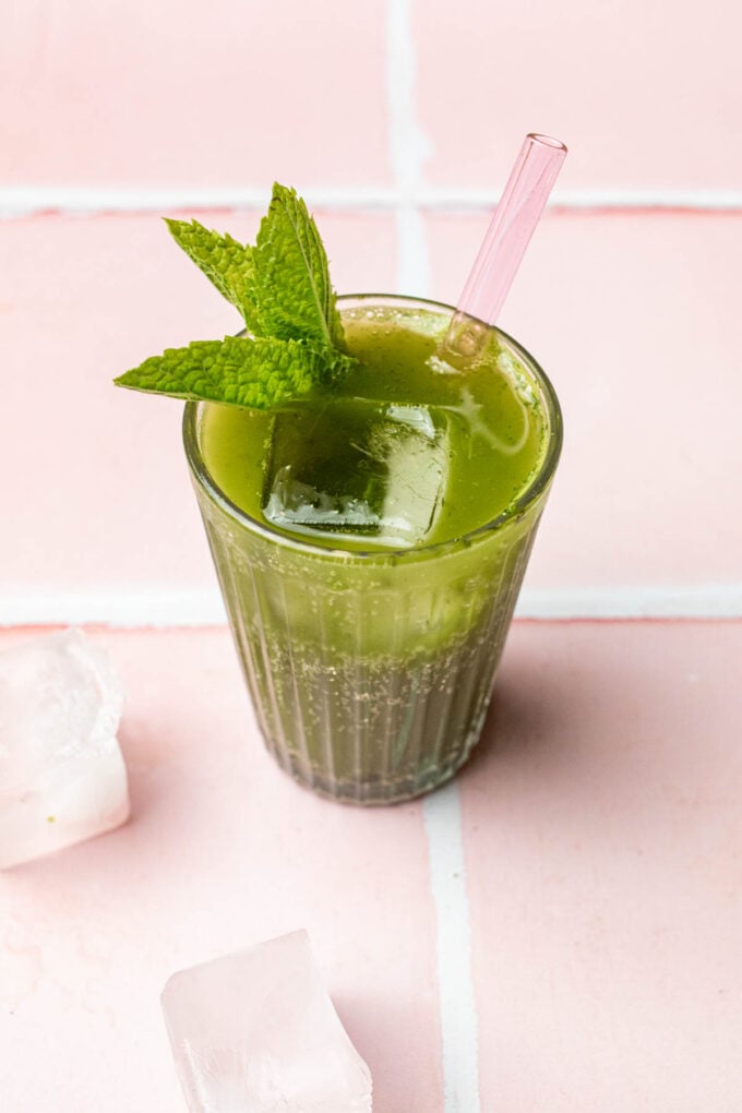 matcha soda in glass with straw